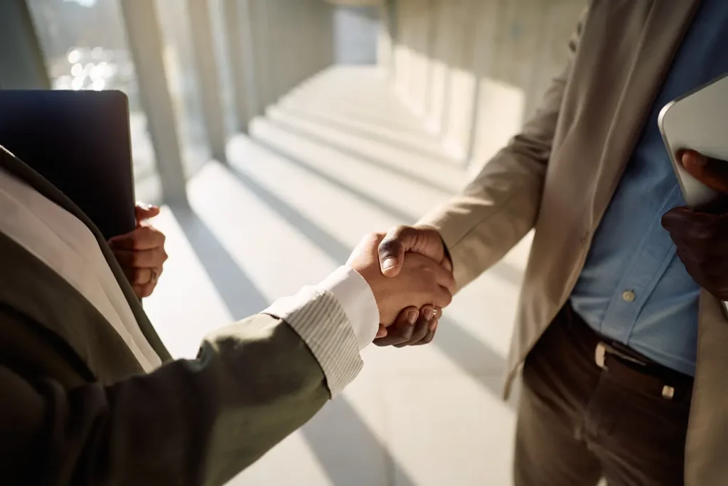 close up of business people handshaking while meet 2026 03 23 17 17 15 utc 1